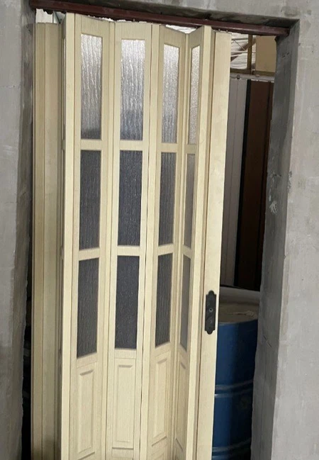 With transparent glass PVC folding door